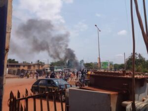 Heavy protest in Ogun as angry youth block road, attempt to burn down GTbank over naira notes scarcity  
