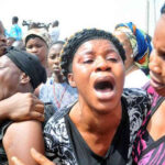 Nigerian woman crying , tears