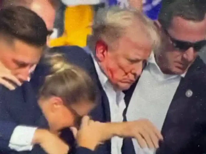 Trump Evacuated from Pennsylvania Rally Stage Amid Gunfire Scare