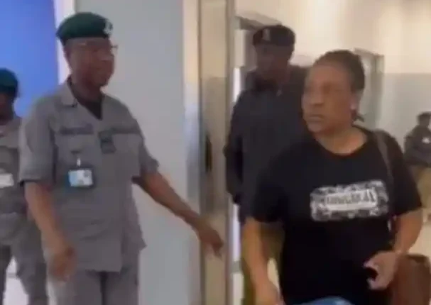 Drama As Nigerian Woman Tears Her Husband’s International Passport On Arrival At Airport