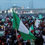 nigeria-@64:-fg-plans-low-key-celebration-as-nigerian-youths-protest-against-hunger